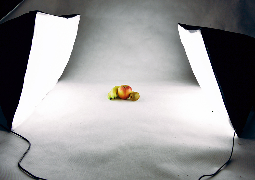 Two softboxes in use by a professional food photographer